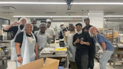 A group of students volunteering.