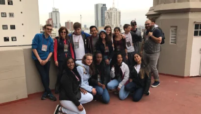 harvey students pose for a group shot on a rooftop in buenos aires