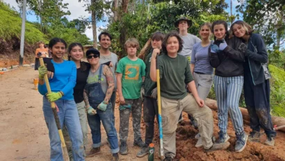 A group of teenagers from Global Works' many teen travel programs working on a community service or environmental project abroad.