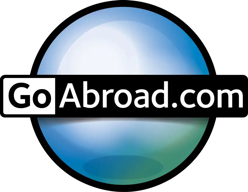 A circular blue and green gradient logo with the text "GoAbroad.com" in bold white and black letters across the center.