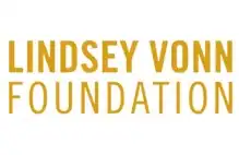 Lindsey Vonn Foundation logo with the foundation name in bold, uppercase gold letters on a white background.